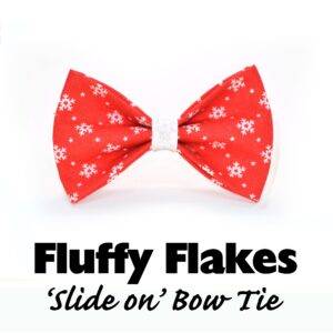 ‘Fluffy Flakes’ red bow tie with white snowflakes for small dogs and cats.